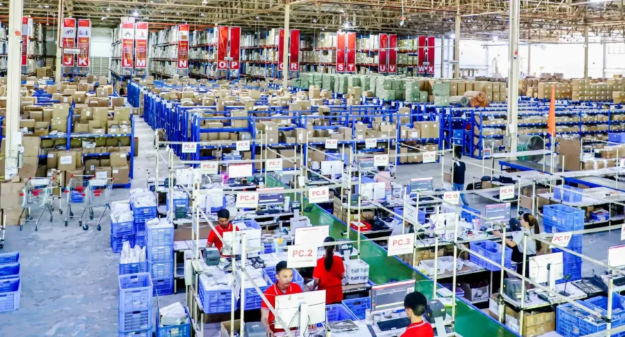 Large warehouse with workers
