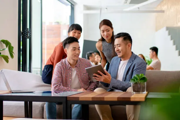 chinese startup team modern office collaboration (1)